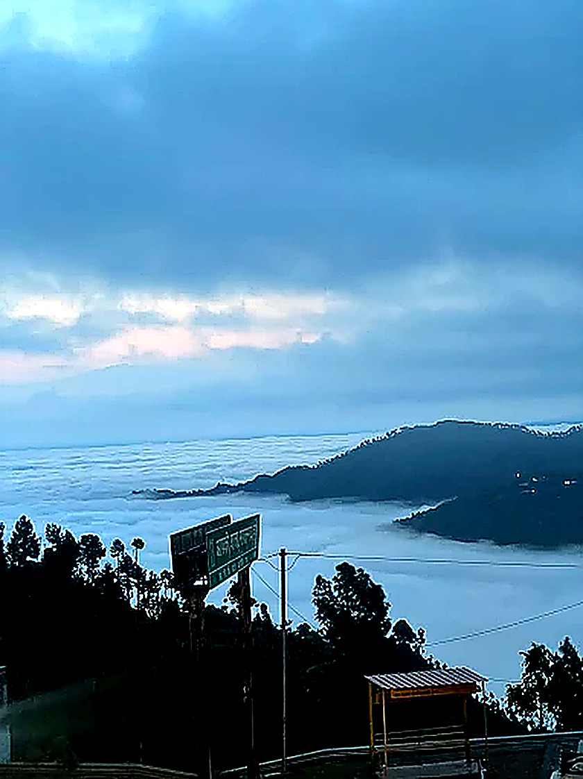 breathtaking mountain fog sunrise view from Hotel Dev Ganga Uttarakhand